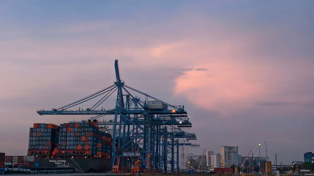 Container cranes at Cai Mep terminal at sunset